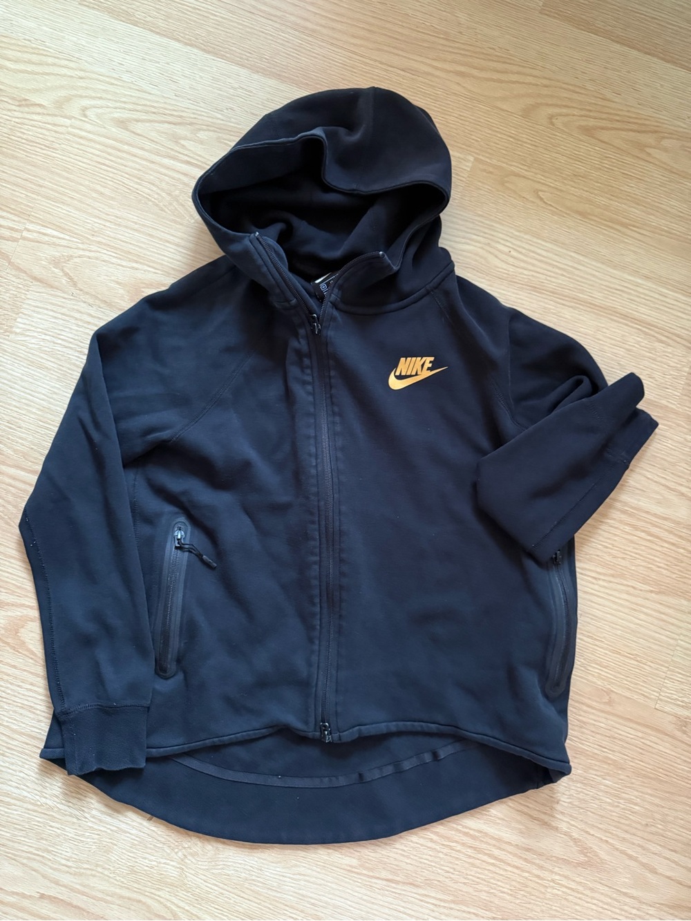 Nike women’s black/gold hooded zip up sweater size medium